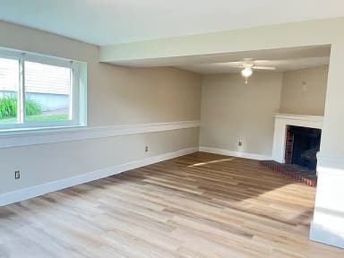 Entry foyer with stairs and updated flooring